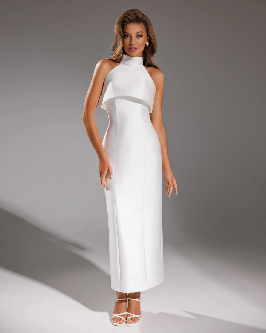 Wedding dress with a straight silhouette and midi length with a bolero.