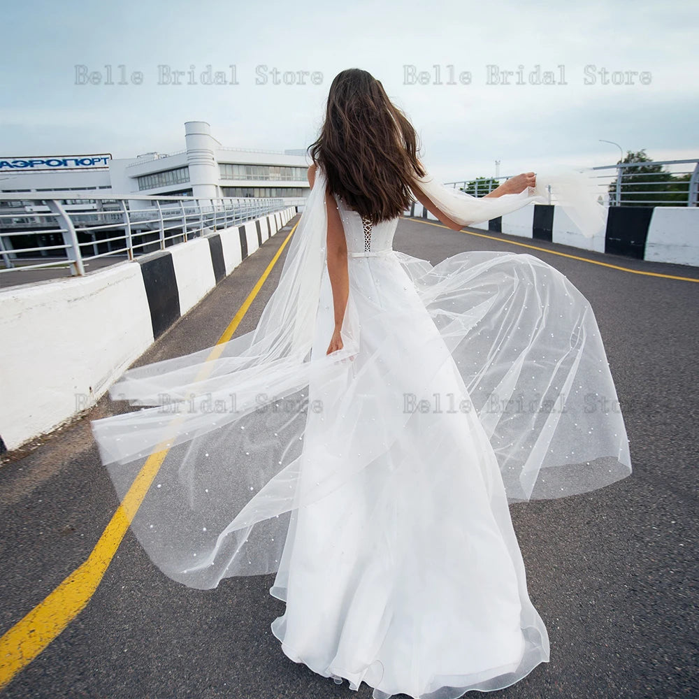 Elegantes vestidos de novia blancos de vecinos de novia de color nueces perlas