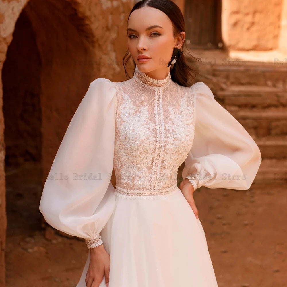 Robes de mariée élégantes High Neck Robes à manches longues modestes robes de mariée en dentelle Appliques paillettes Train de balayage A-Line свадебное платье