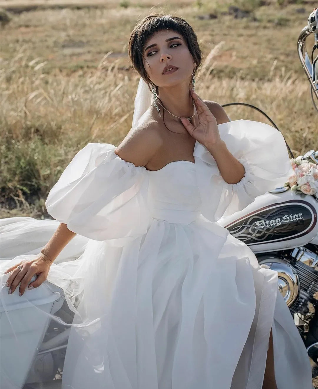 Vintage long sweetheart wedding dress with Puff sleeves A-line pleated sweep train with slit bridal dress on the beach outdoors