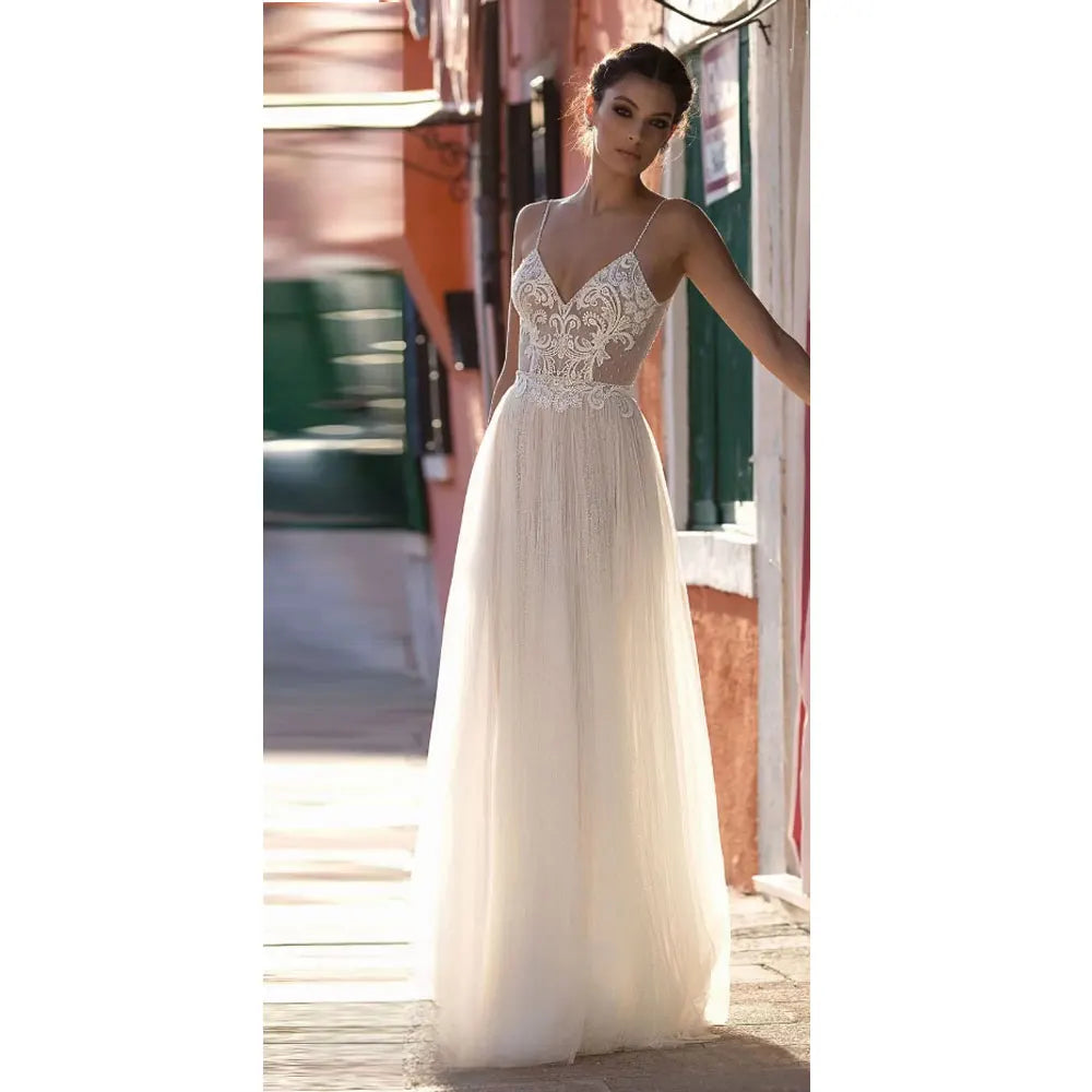 Semplice filato bianco abiti da sposa una linea spaghetti cinghia sweep treno in pizzo applique spiaggia abiti illusione abito da sposa a buon mercato