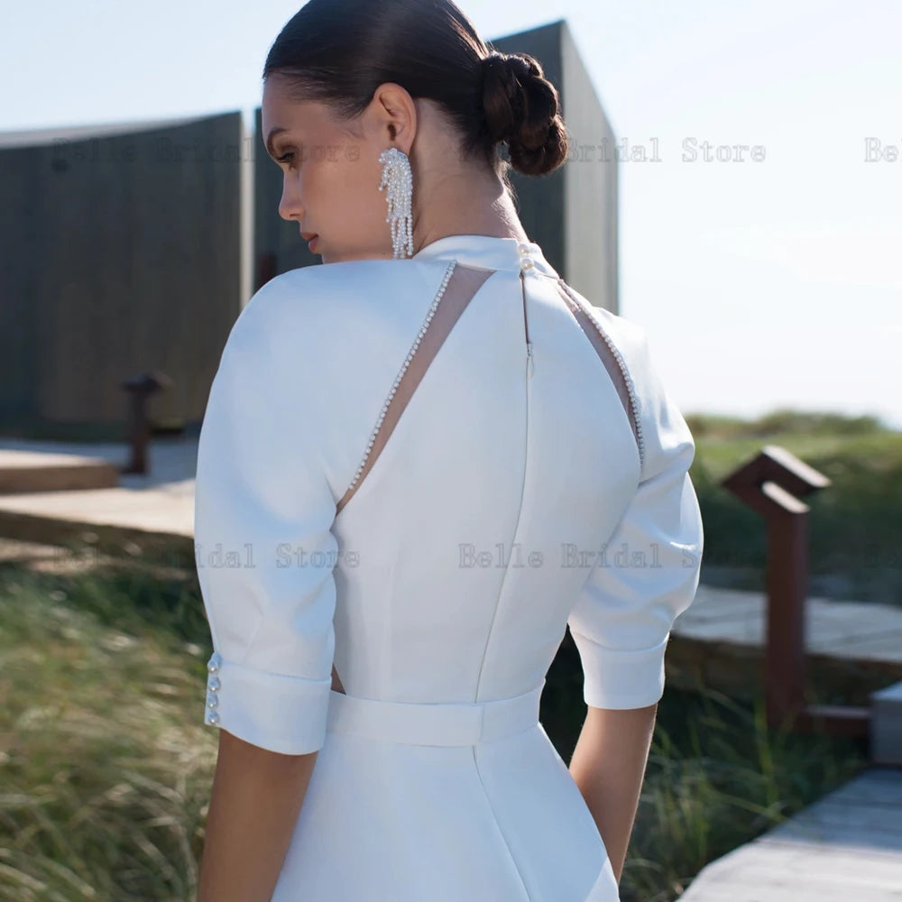 Elegantes vestidos de novia Mangas de hojaldre de cuello alto.