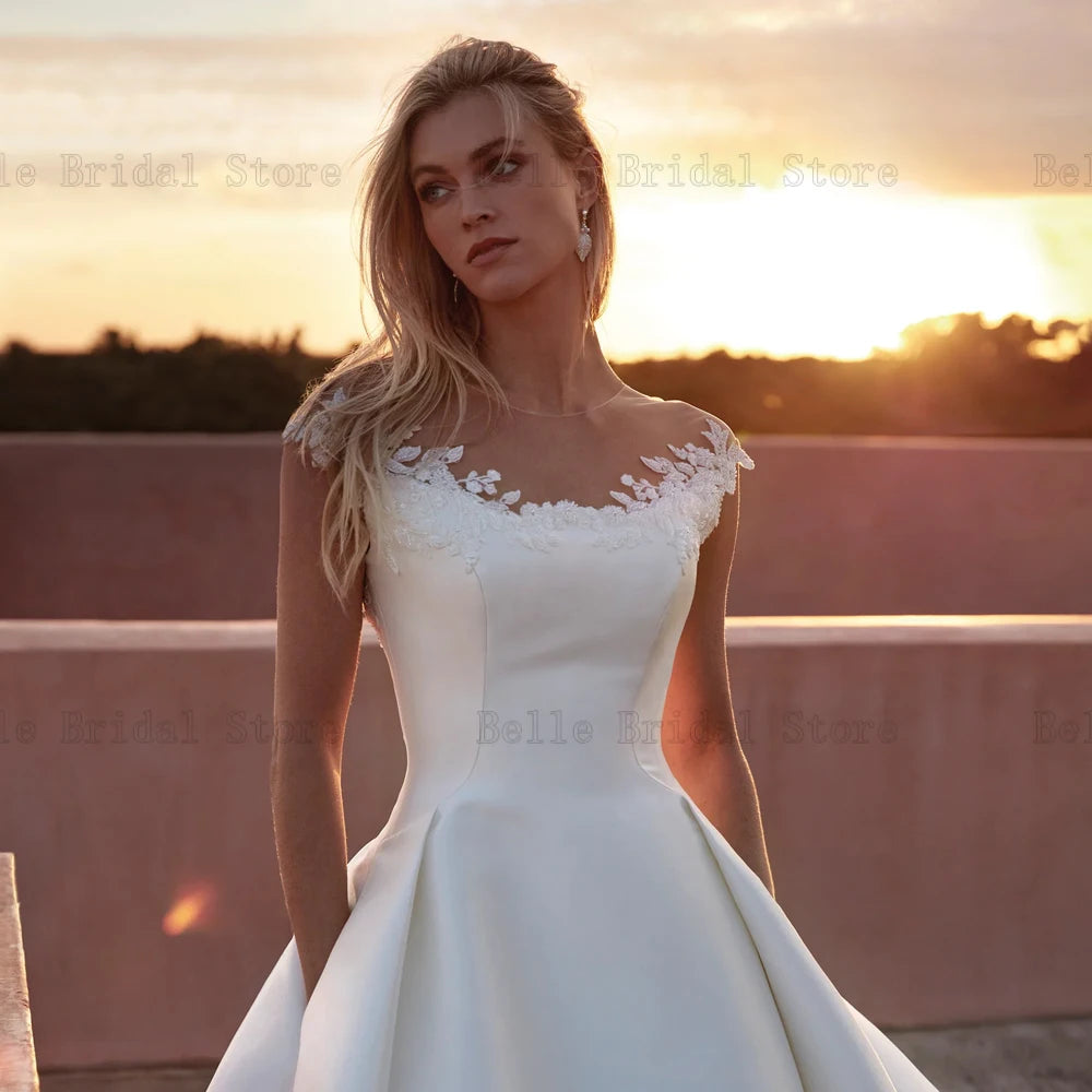 Elegant Wedding Dresses Jewel Neck Cap Sleeves Bridal Gowns Appliques Back Button Floor Length A-Line Satin Vestidos De Novia