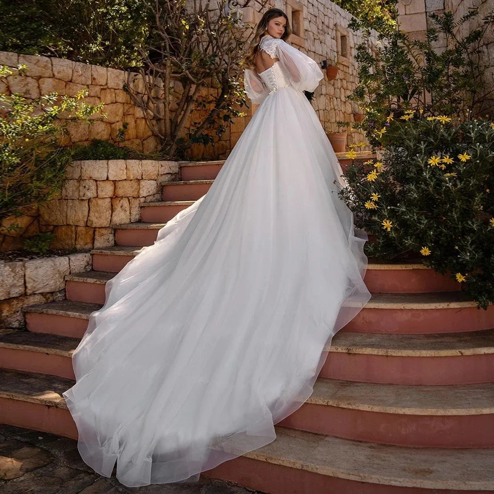 Robe de mariée en ligne à manches bouffantes de luxe pour mariée princesse dentelle en tulle