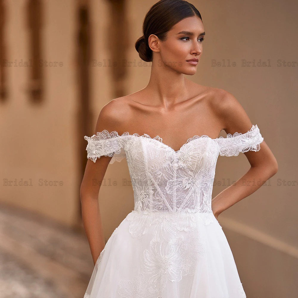 Elegante elfenbeinfarbene Brautkleider schulterfrei ärmellos A-Linie Brautkleider Sweep-Schleppe Frontschlitz Tüll Spitze Vestidos De Novia