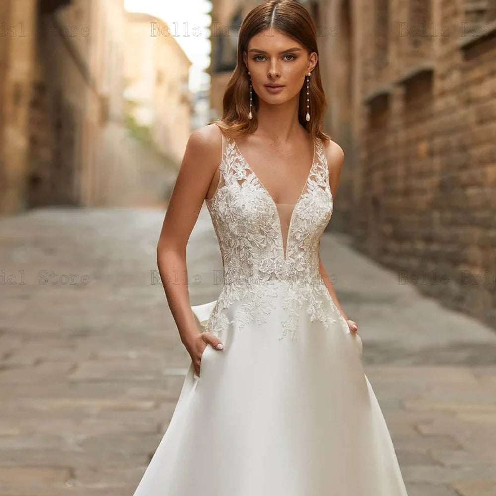 Elegant Ivory Wedding Dresses V Neck Sleeveless Bridal Gowns Appliques Back Bow A-Line Sweep Train Satin Vestidos De Novia 2023