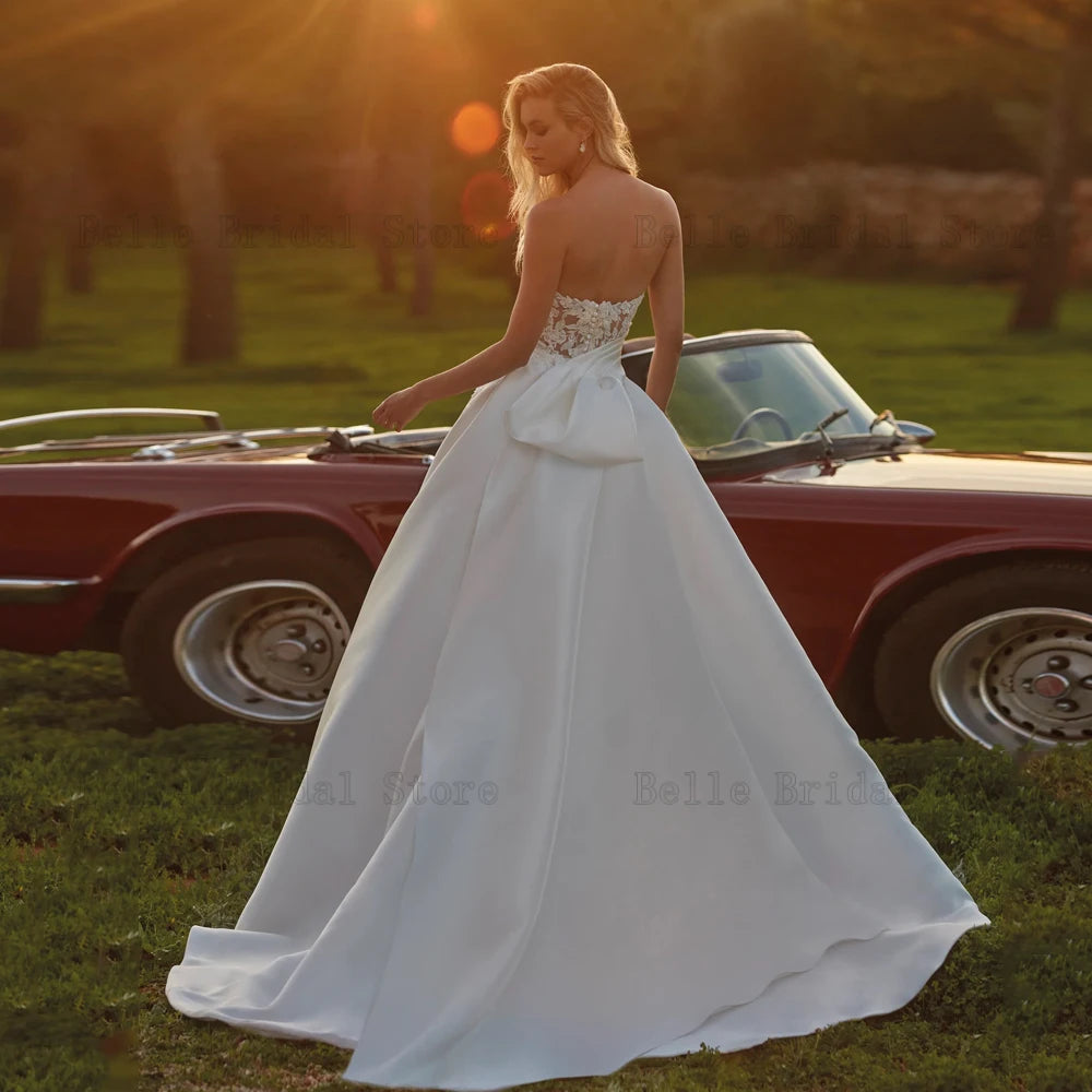 Elegantes vestidos de novia de una línea A necio Cuello sin mangas vestidos de novia Applices Beads Longitud de piso Vestidos de Novia 2024