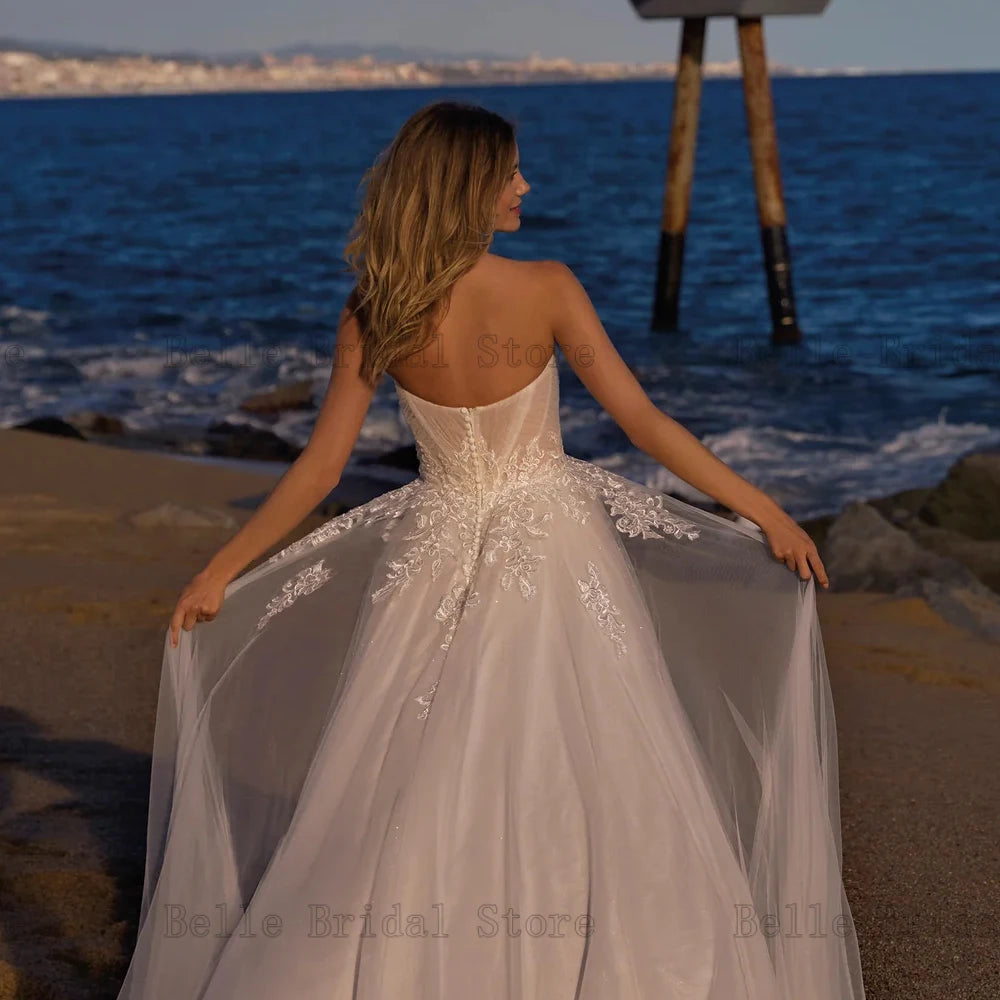 Eleganti abiti da sposa a cuore Cuci senza maniche abiti da sposa Appliques Lunghezza pavimento a una linea Tulle Vestidos de noni 2024