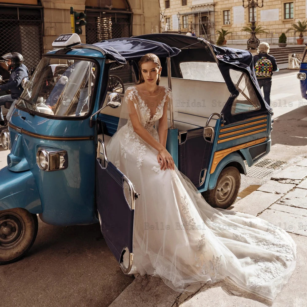 Vestidos elegantes de noiva de marfim de marfim de faghetti tira o pescoço de noiva dos noivos Aplique Ilusão Trem de Tulle A-Line Tulle Vestidos de Novia