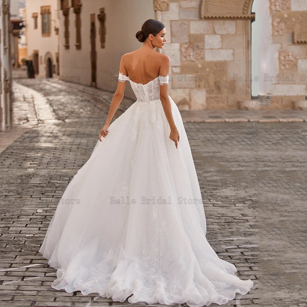 Vestidos de noiva elegantes de marfim fora do ombro sem mangas A-line Vestidos de noiva varrem de trem dianteiro Tulle Tulle Vestidos de Novia