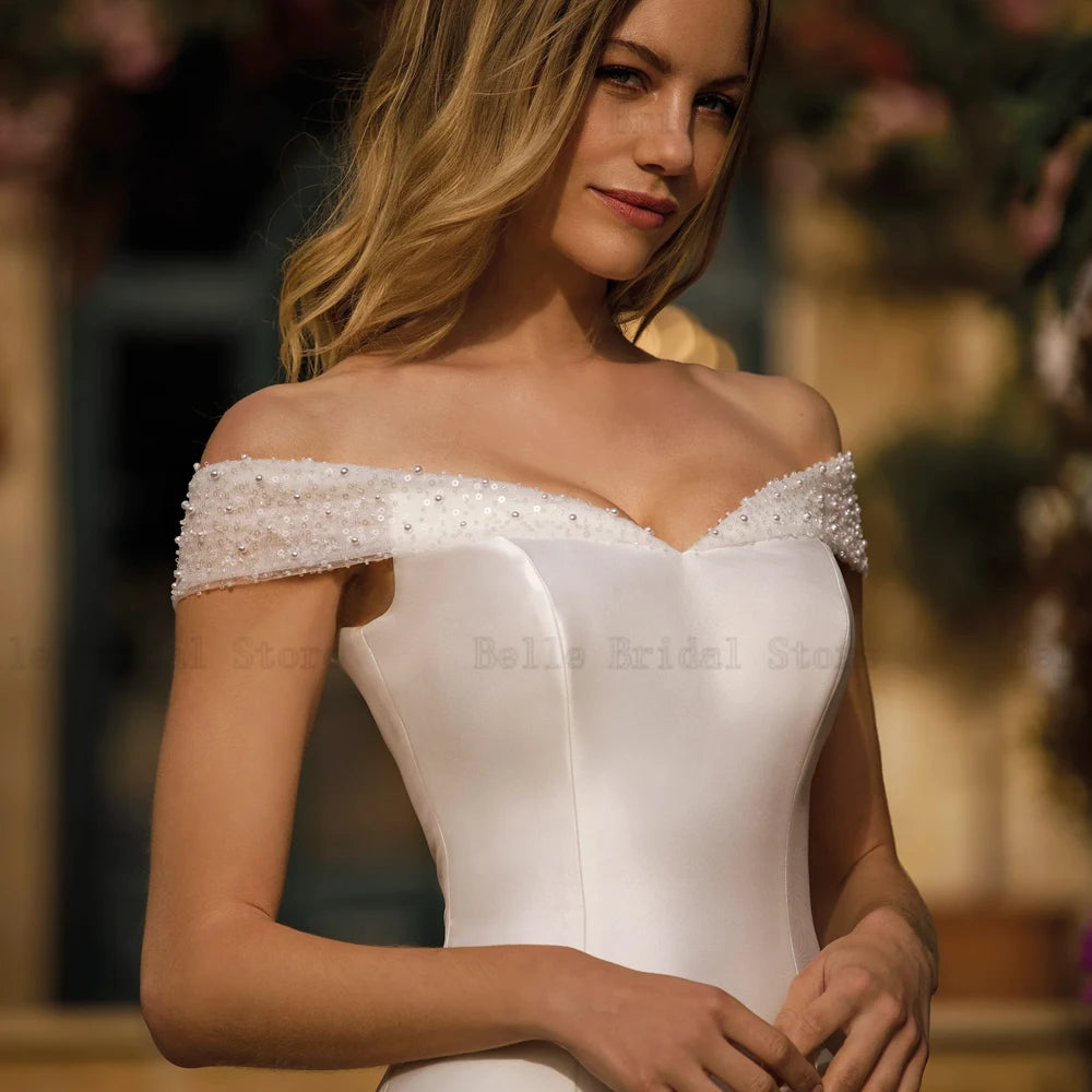 Classici abiti da sposa fuori spalla v Neck Manlevelestry Abiti da sposa perle perle lunghezza del pavimento a una linea Vestidos de novi 2024