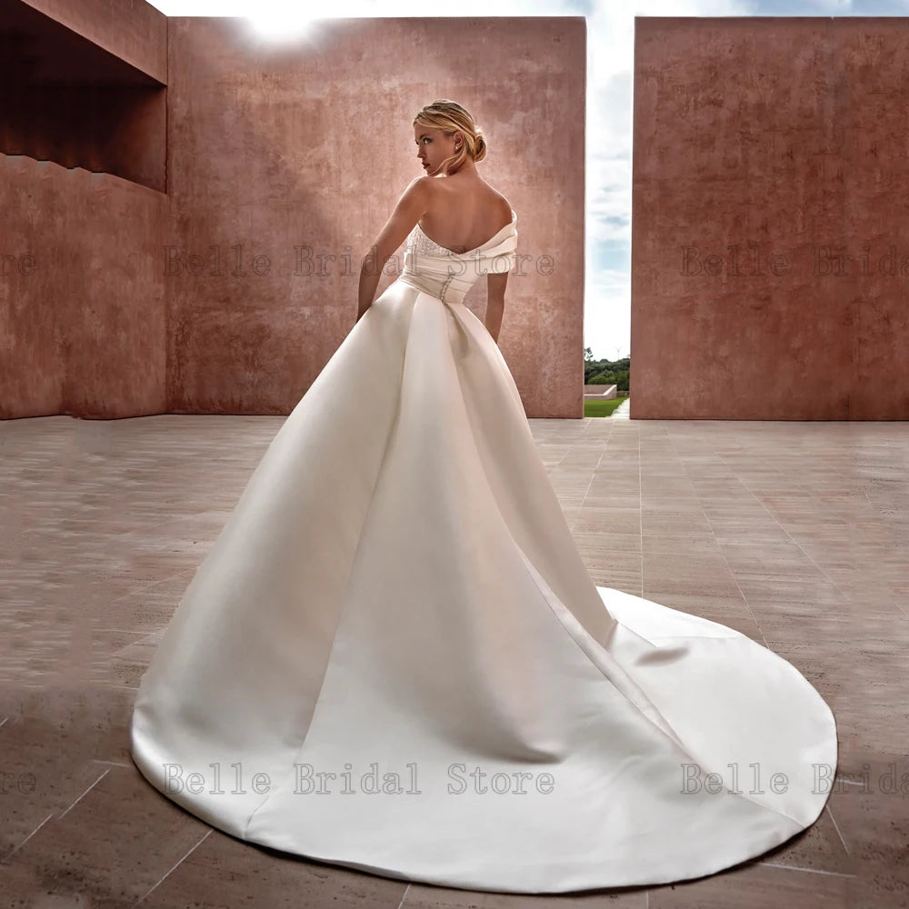 Elegante One-Shoulder-Brautkleider Sweetheart Neck Brautkleider Perlen Zurück Button Bodenlangen A-Linie Satin Vestidos De Novia