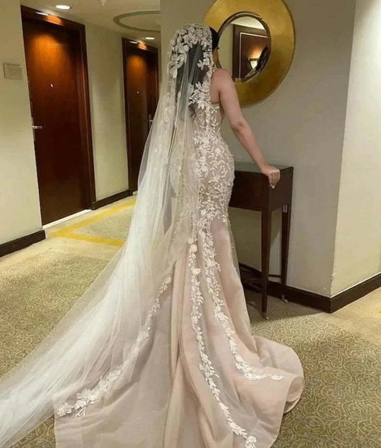 Vestidos de novia de champán sirena de melocotón.