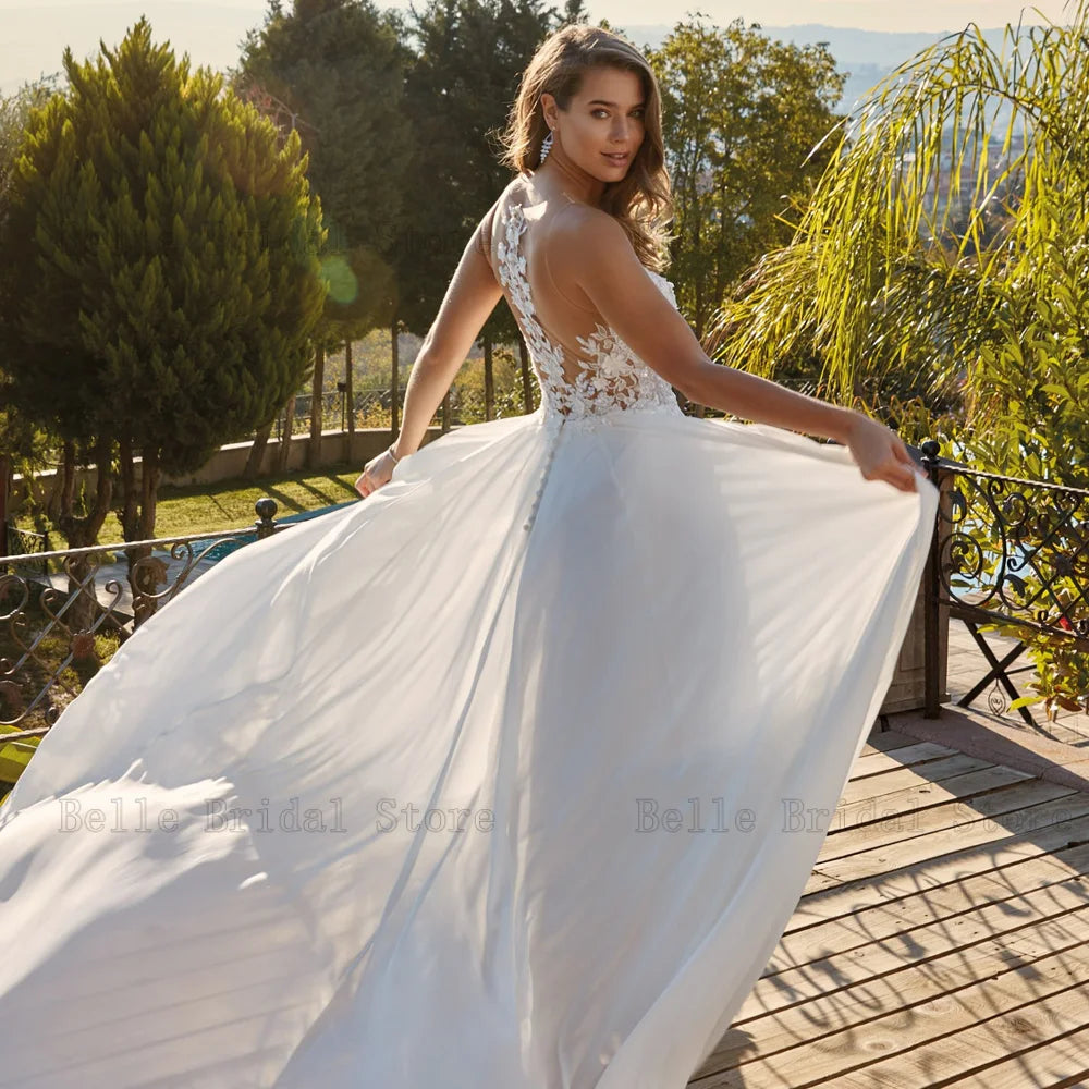 Robes de mariée en mousseline de mousseline élégante V couche sans manche robes de mariée en arrière appliques perles balayez le train A-line свадебное платье 2023