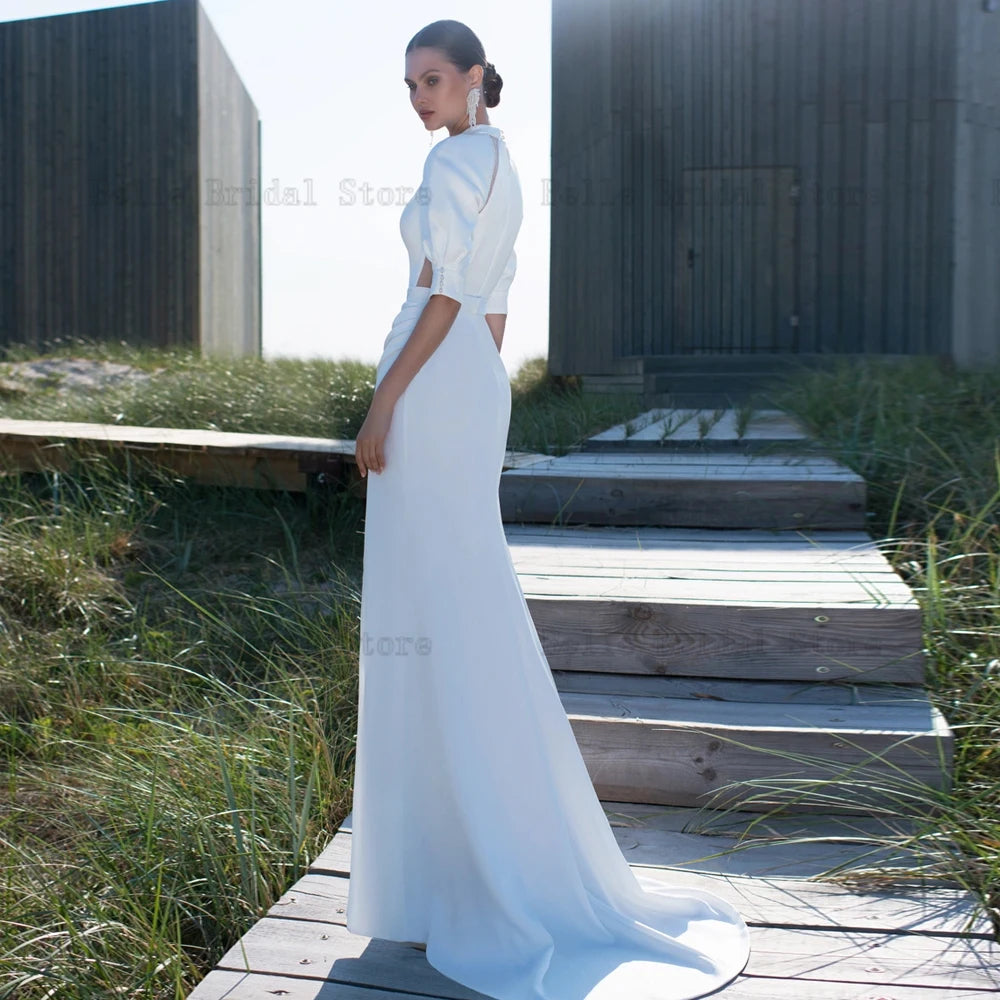 Elegantes vestidos de novia Mangas de hojaldre de cuello alto.