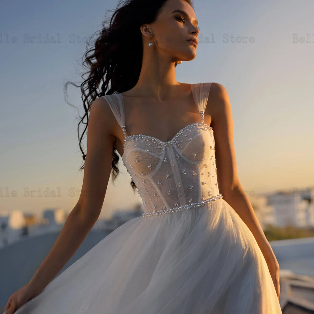 Spaghetti simples bretelles Robes de mariée chérie couche-manche de mariée des perles de sol en tulle Vestidos de novia 2024