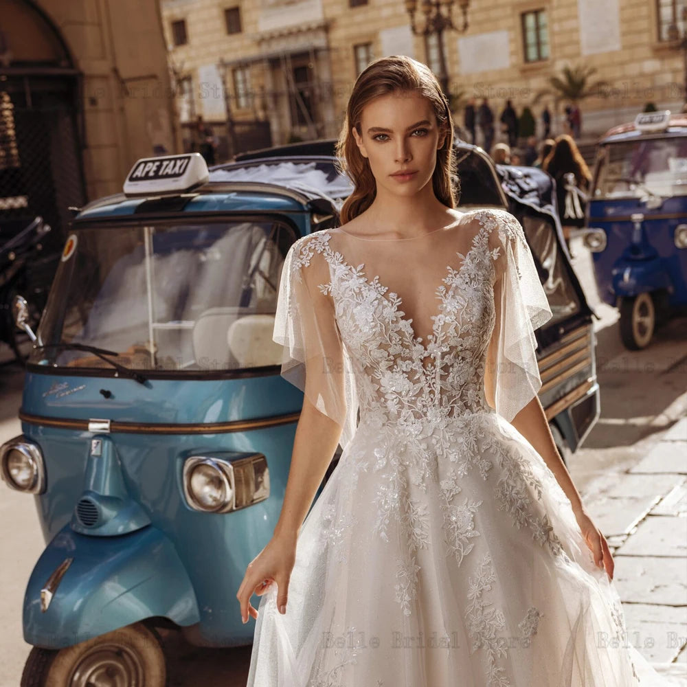 Elegantes vestidos de novia marfil con correas de espagueti o cuello de nupcial Apliques Apliques Ilusión Sweing Train A-Line Tul Vestidos de Novia