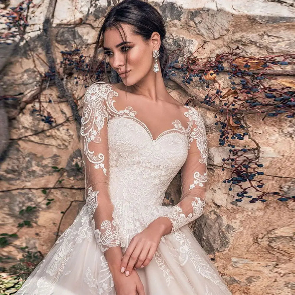 FISA Hermoso Vestido de boda de mangas largas de encaje 2024 Apliques Ilusión de vestidos de novia Ilusión espalda breve tul a una línea Vestidos de Novia