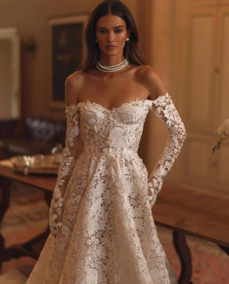 Luxury une robe de mariée en dentelle linéaire vintage à manches longues sexy