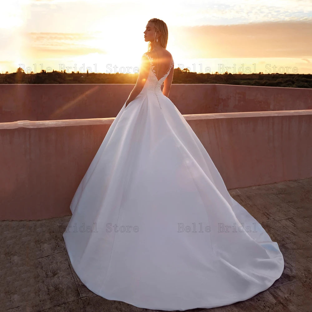 Elegantes vestidos de novia Mangas de la gorra del cuello joya Apliques del botón de retroceso del piso Longitud A-Línea Vestidos de Novia