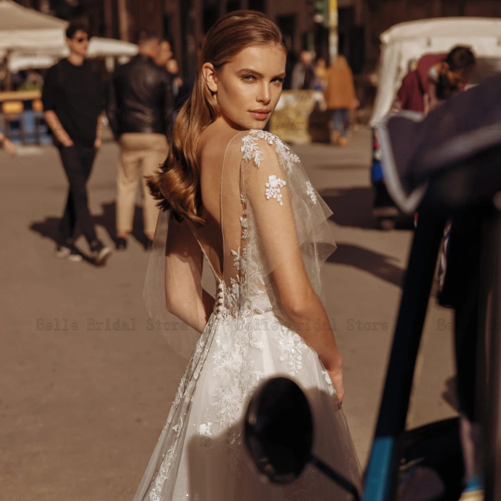 Vestidos elegantes de noiva de marfim de marfim de faghetti tira o pescoço de noiva dos noivos Aplique Ilusão Trem de Tulle A-Line Tulle Vestidos de Novia