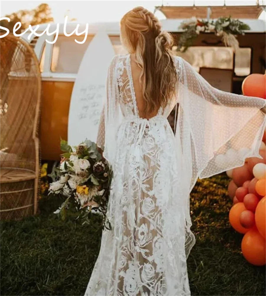 Vestido de novia boho de encaje de hadas con mangas de bengalas