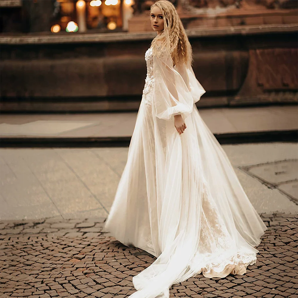 Vestido de boda de manga de bufla con cuello en V