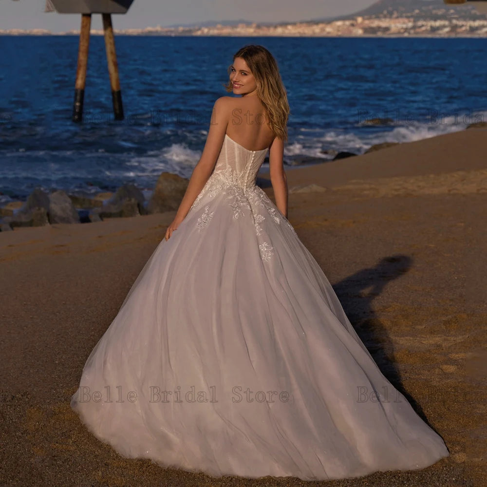 Eleganti abiti da sposa a cuore Cuci senza maniche abiti da sposa Appliques Lunghezza pavimento a una linea Tulle Vestidos de noni 2024