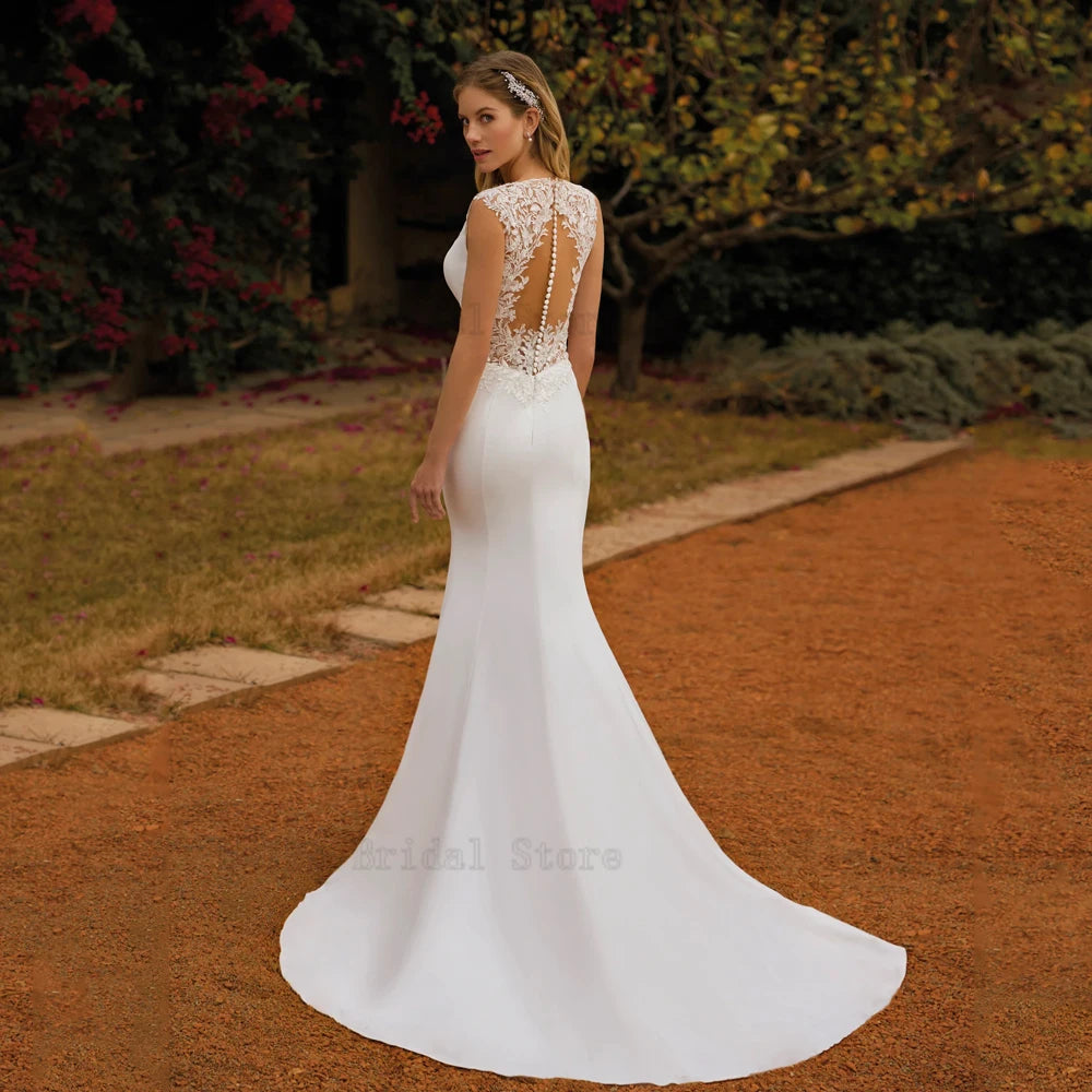 Klassische Meerjungfrau Brautkleider V-Ausschnitt Ärmellose Brautkleider Applique Back Button Illusion Bodenlangen Vestidos De Novia 2024