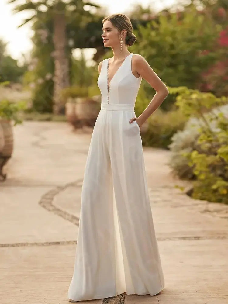 Unique White Two Pieces Wedding Dresses V Neckline Pants Suit Bridal Gowns Half Sleeve Bride Dress Beach 2024 Jumpsuit Boho