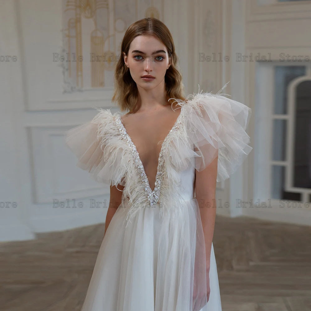 Sexy Wedding Dresses Deep V Neck Short Sleeves Bridal Gowns Beads Feather Backless High-Low Sweep Train A-Line Robe De Mariee